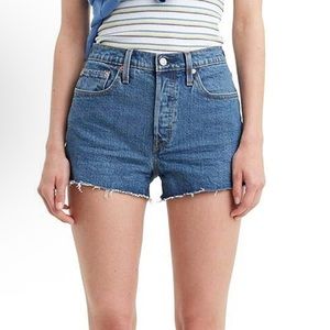 Levi’s 501 high rise, button up Jean shorts.